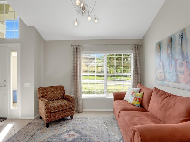 living room with lofted ceiling and light tile patterned floors