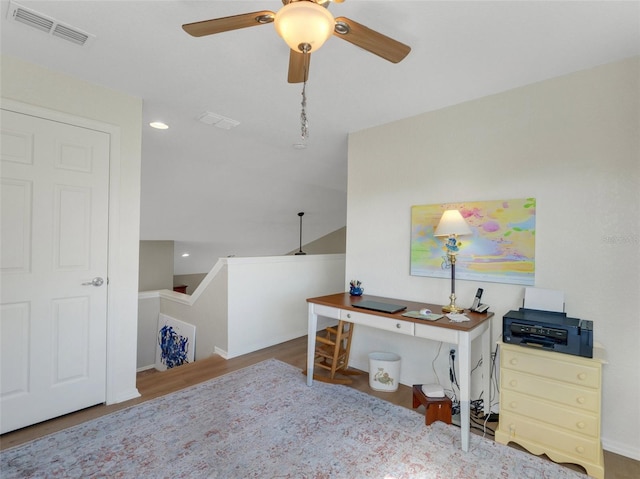 office space featuring ceiling fan and light hardwood / wood-style flooring