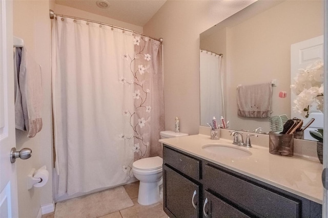 full bathroom with tile patterned flooring, vanity, and toilet