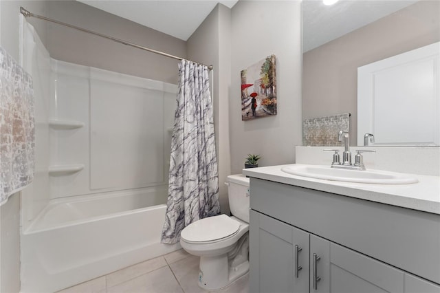 full bathroom with toilet, vanity, tile patterned flooring, and shower / tub combo with curtain