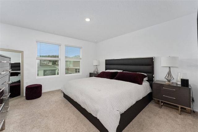 bedroom with light carpet