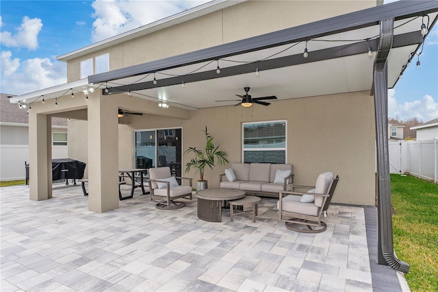 view of patio with ceiling fan and an outdoor hangout area