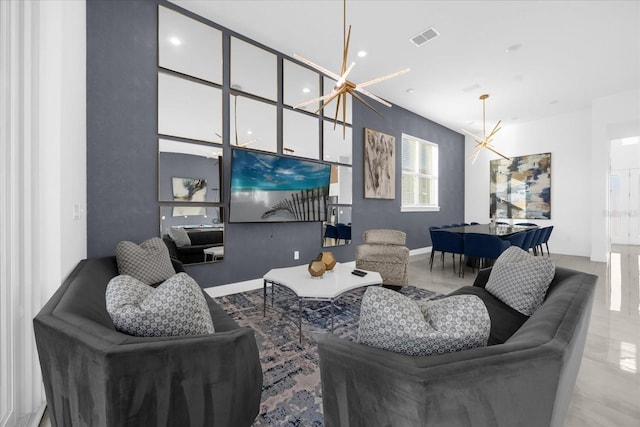 living room featuring a notable chandelier