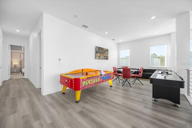 playroom with light wood-type flooring