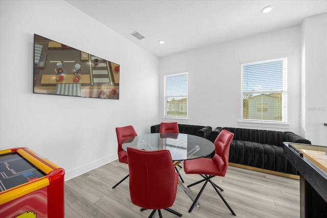 dining area featuring light wood-type flooring