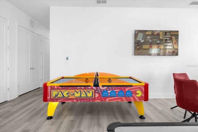 playroom with hardwood / wood-style floors