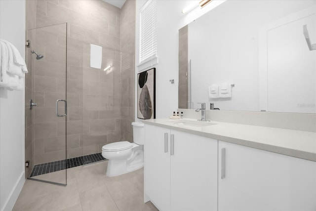 bathroom with walk in shower, vanity, toilet, and tile patterned flooring