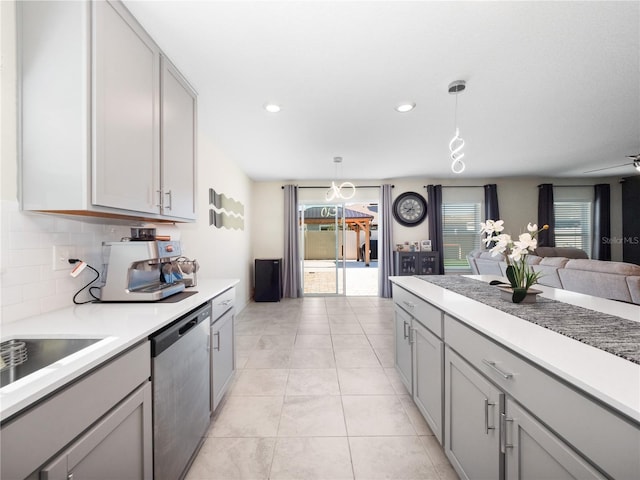 kitchen with gray cabinets, decorative backsplash, decorative light fixtures, light tile patterned flooring, and dishwasher