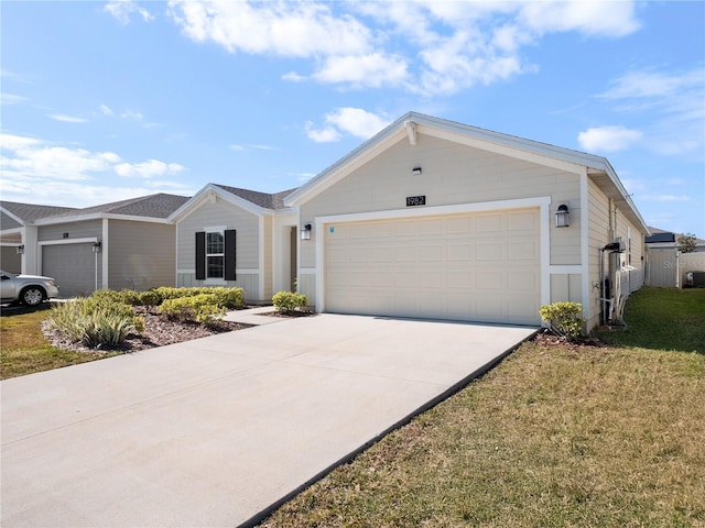 single story home featuring a front lawn and a garage