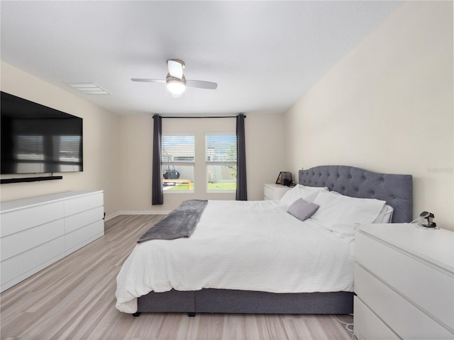 bedroom featuring ceiling fan and light wood-type flooring