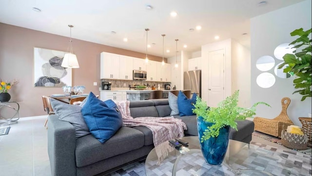 living room with light tile patterned floors