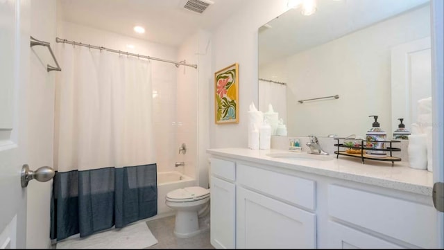 full bathroom featuring toilet, vanity, tile patterned floors, and shower / tub combo with curtain