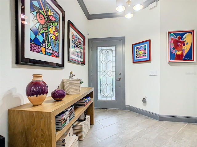 foyer entrance with ornamental molding