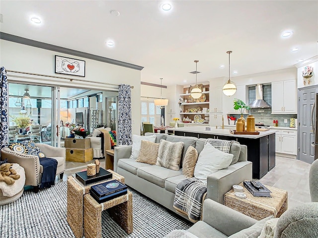 living room with ornamental molding