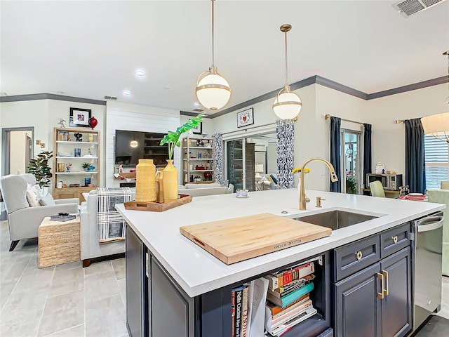 kitchen featuring sink, crown molding, hanging light fixtures, dishwasher, and an island with sink