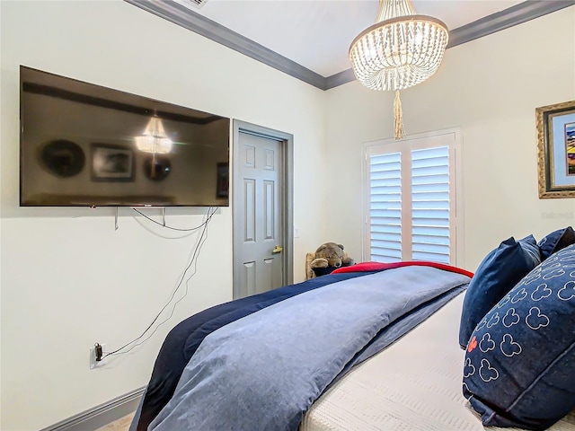 bedroom featuring an inviting chandelier and crown molding