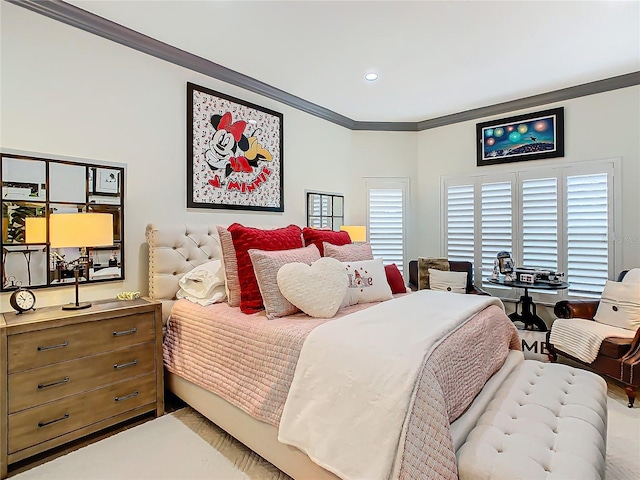 bedroom featuring crown molding