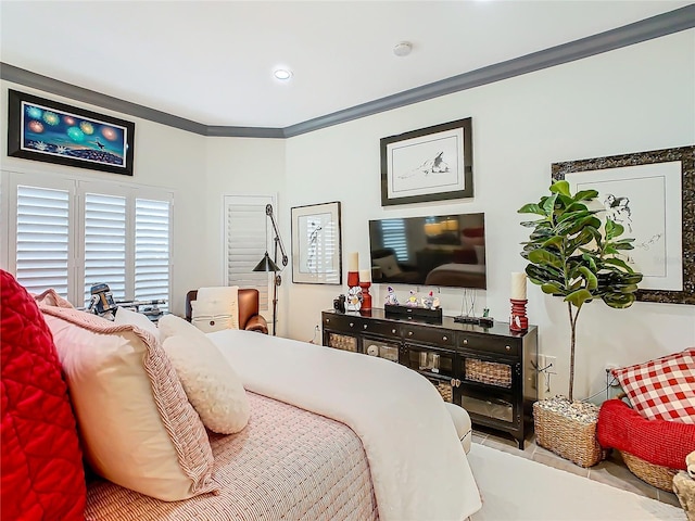 bedroom featuring crown molding