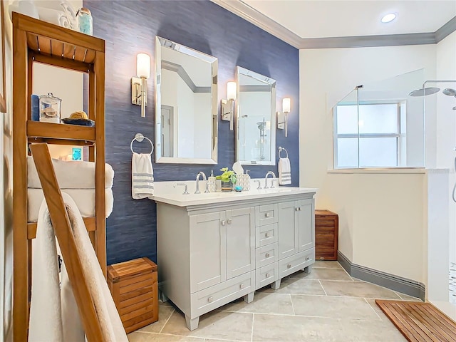 bathroom with vanity, crown molding, tile patterned floors, and a shower