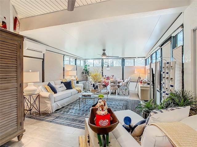 sunroom featuring ceiling fan