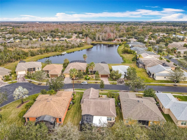 drone / aerial view with a water view