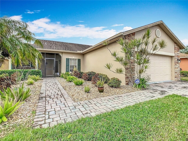 single story home with a garage