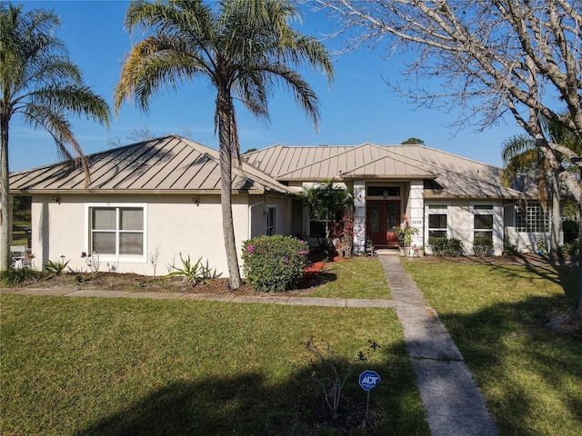 ranch-style home featuring a front lawn