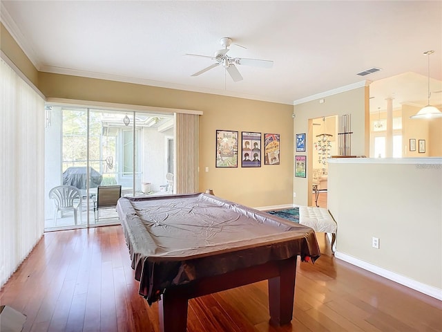 game room featuring ceiling fan, billiards, ornamental molding, and hardwood / wood-style floors