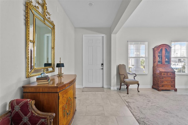 entrance foyer with light tile patterned floors