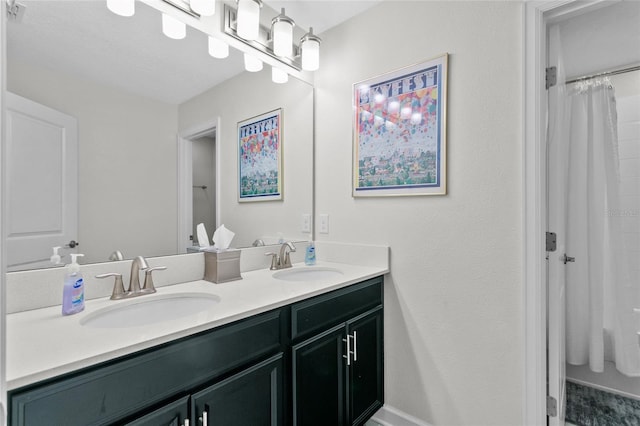 bathroom with french doors, vanity, and shower / tub combo with curtain