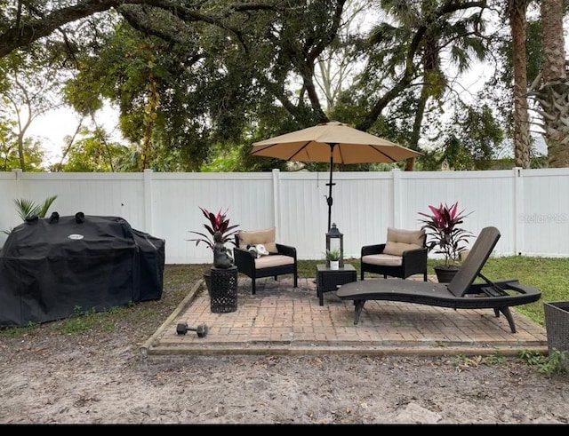 view of patio / terrace featuring a grill