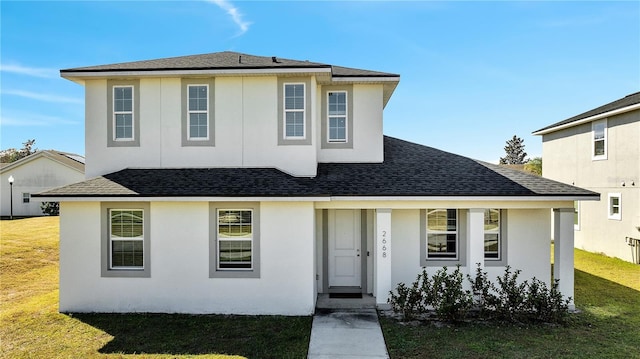 view of front of house with a front lawn