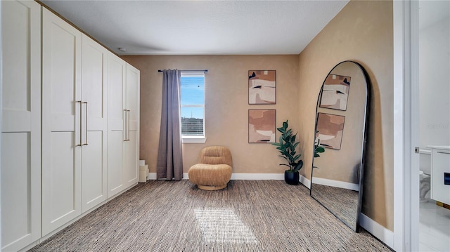 living area with wood-type flooring