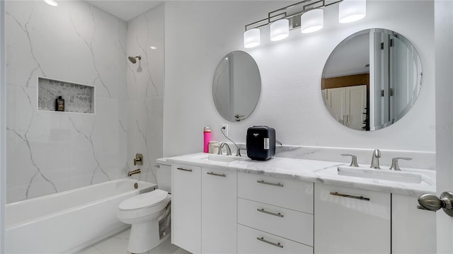 full bathroom with toilet, vanity, and tiled shower / bath combo