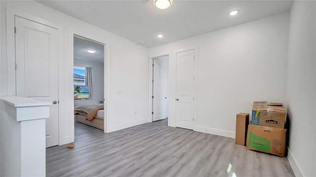 bedroom featuring light wood-type flooring