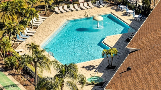 view of swimming pool featuring a patio