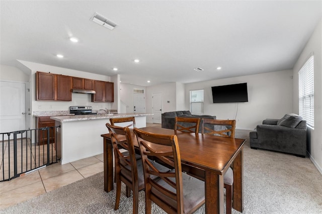 tiled dining space with sink