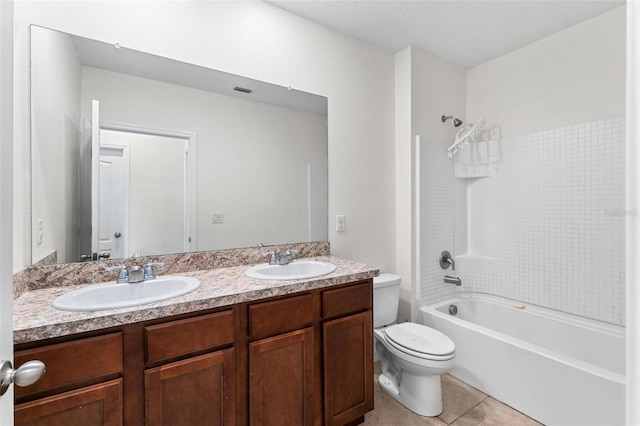 full bathroom with tile patterned floors, toilet, bathing tub / shower combination, and vanity