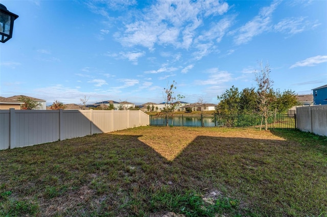 view of yard featuring a water view