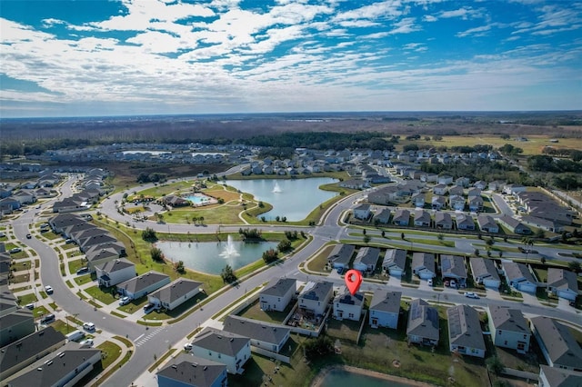 drone / aerial view featuring a water view