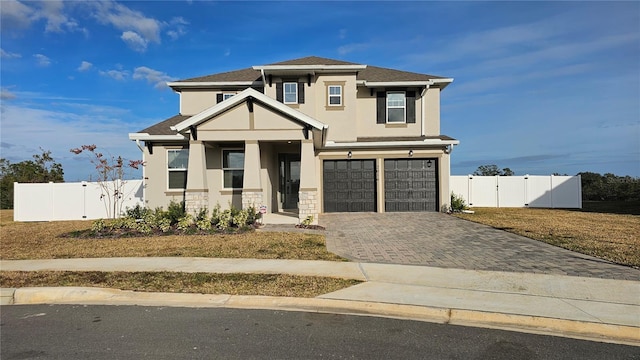 view of front of property featuring a garage