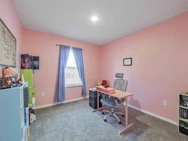 office space featuring carpet floors and a textured ceiling