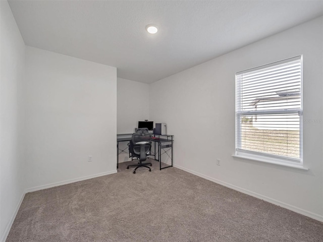 unfurnished office with light carpet