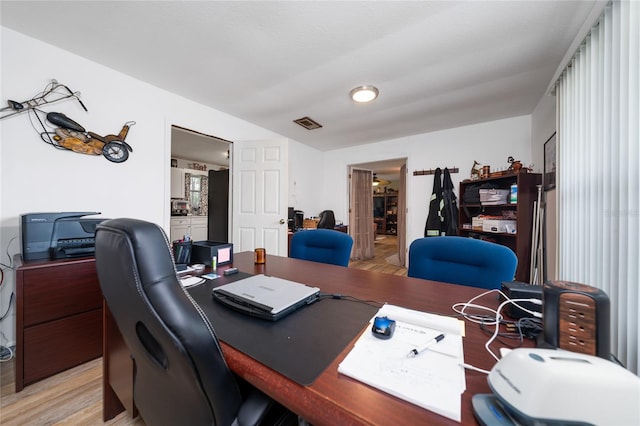 office area featuring light wood-type flooring