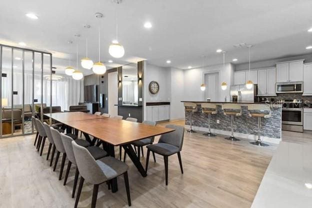 dining area featuring light hardwood / wood-style floors