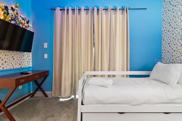 unfurnished bedroom featuring carpet floors