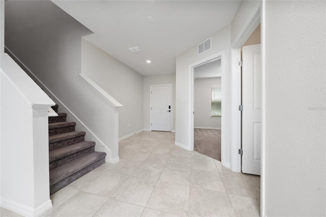 interior space with light tile patterned flooring