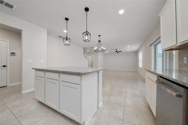 kitchen featuring ceiling fan, white cabinets, light stone counters, and stainless steel dishwasher