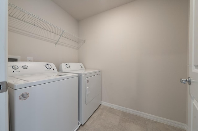 laundry area featuring washer and clothes dryer