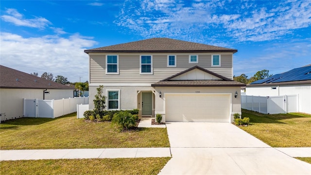 view of front of home with a front yard and a garage